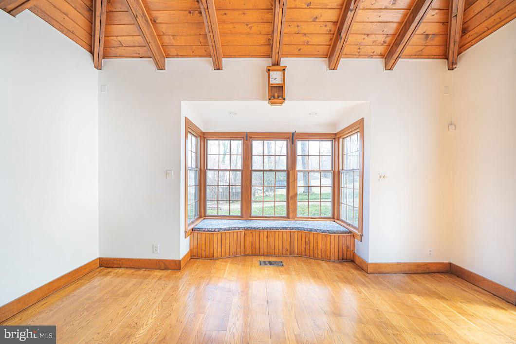 642 Pugh Road Wayne, PA 19087 - Photo 23 of 65 a view of a bedroom with a bed and wooden floor