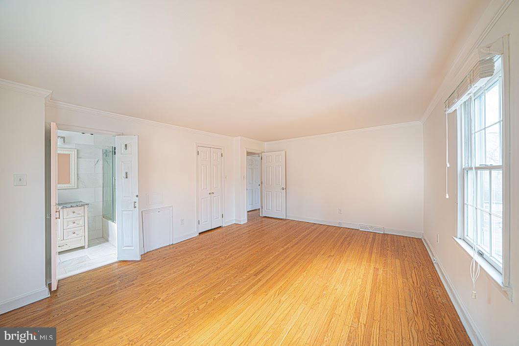 642 Pugh Road Wayne, PA 19087 - Photo 26 of 65 a bedroom with a bed and a window