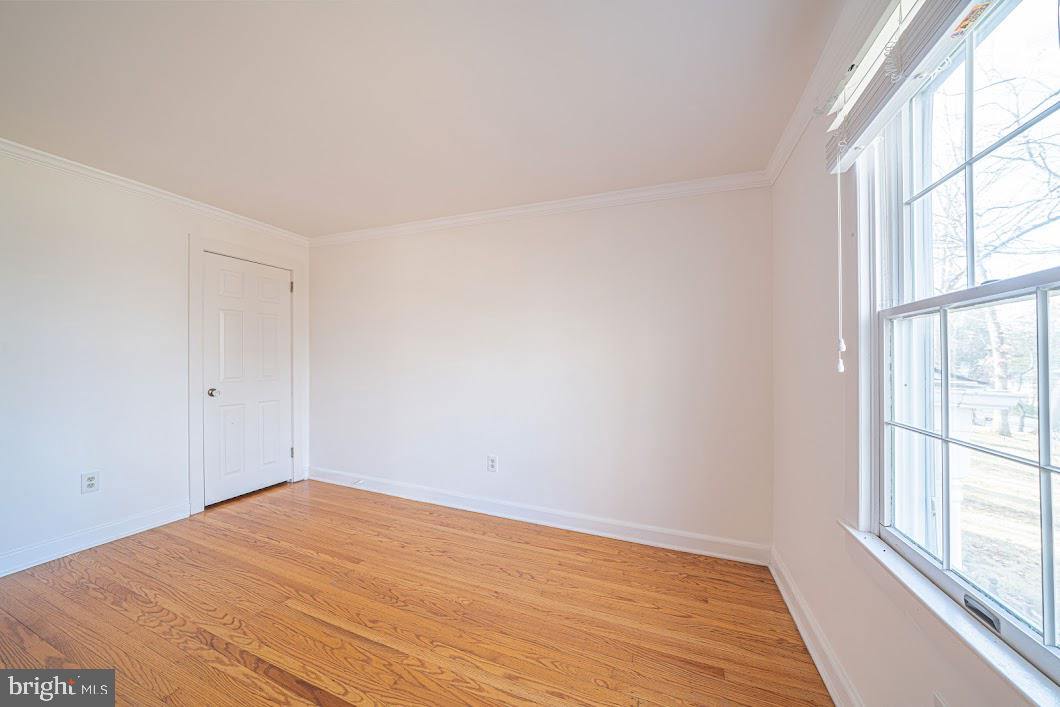 642 Pugh Road Wayne, PA 19087 - Photo 32 of 65 wooden floor in an empty room with a window