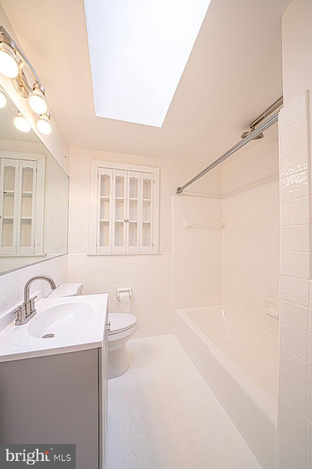 642 Pugh Road Wayne, PA 19087 - Photo 33 of 65 a bathroom with a sink and a mirror