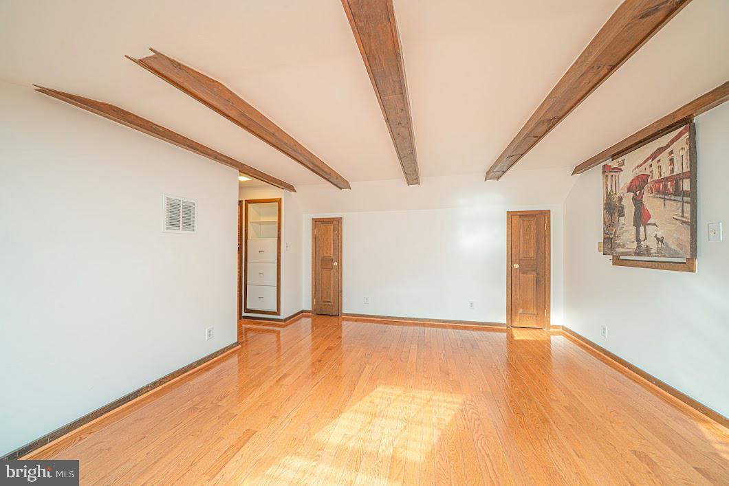 642 Pugh Road Wayne, PA 19087 - Photo 38 of 65 a view of an empty room with wooden floor