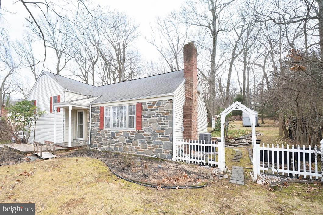 642 Pugh Road Wayne, PA 19087 - Photo 47 of 65 a front view of a house with a porch