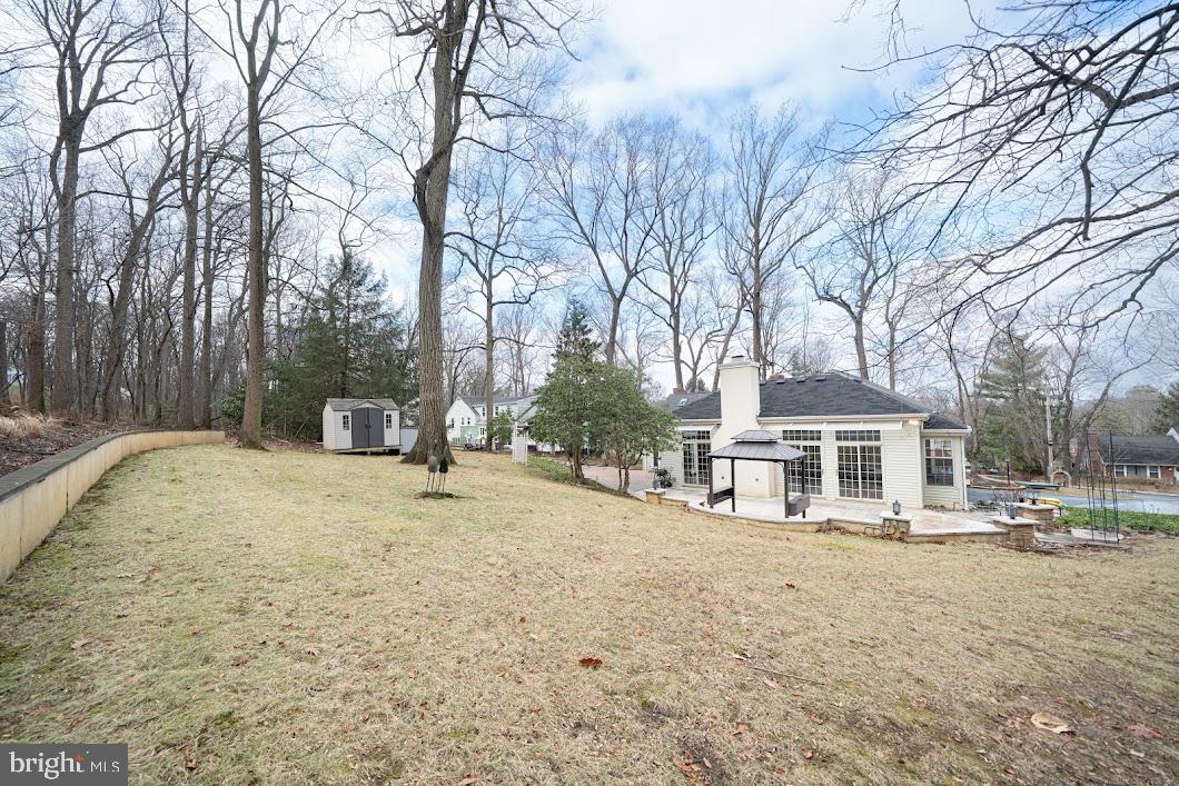 642 Pugh Road Wayne, PA 19087 - Photo 59 of 65 a backyard of a house with yard and tree