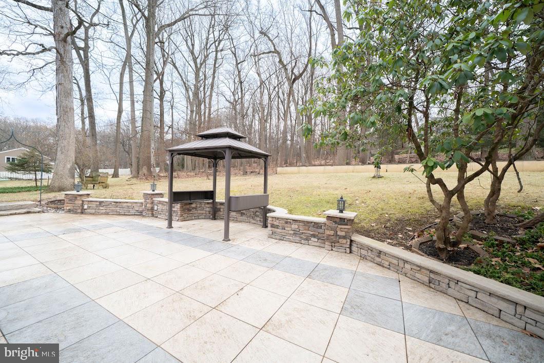 642 Pugh Road Wayne, PA 19087 - Photo 65 of 65 a view of a backyard with sitting area