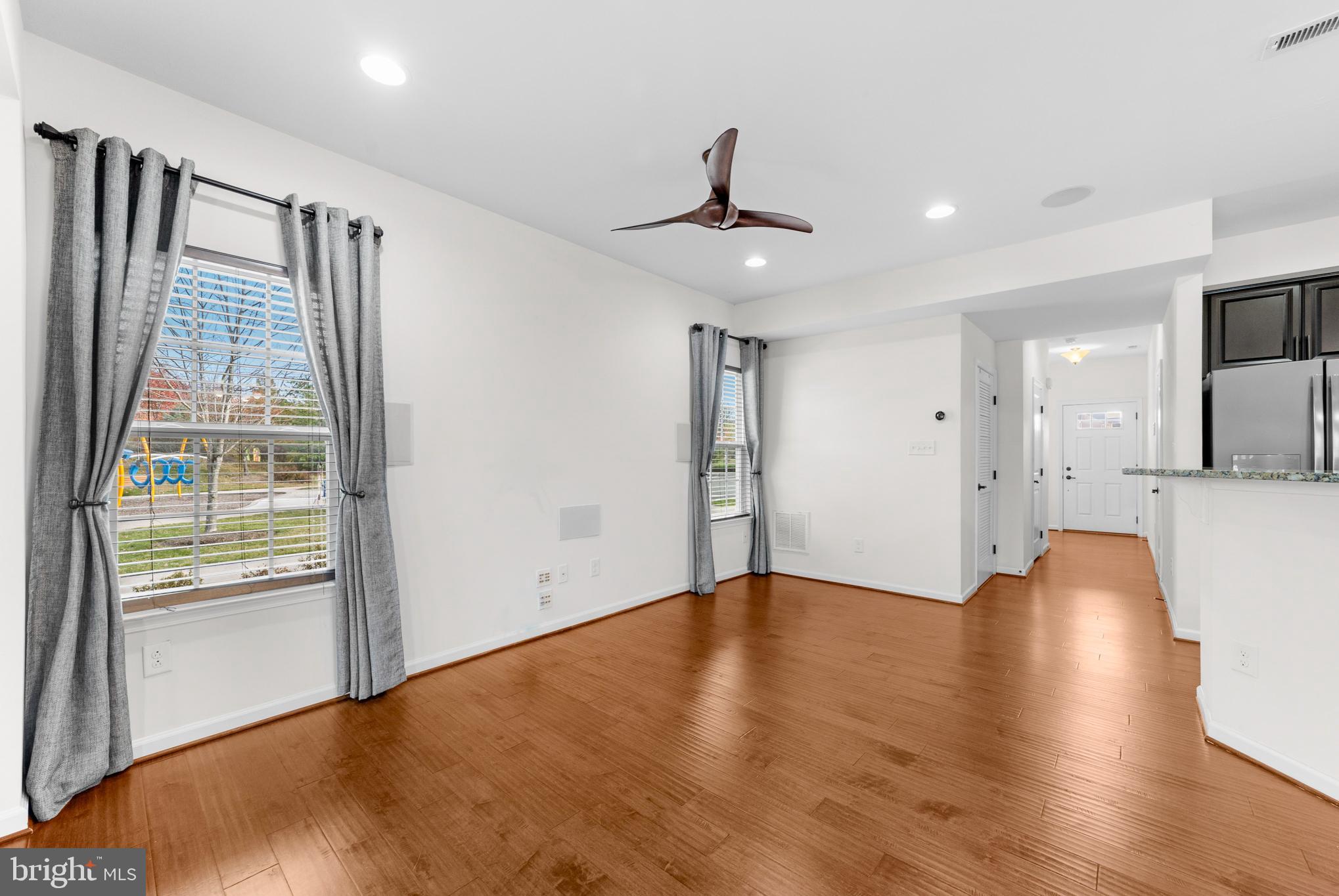 42 Sundance Drive Hamilton, NJ 08619 - Photo 14 of 25 a view of an empty room with wooden floor and a window