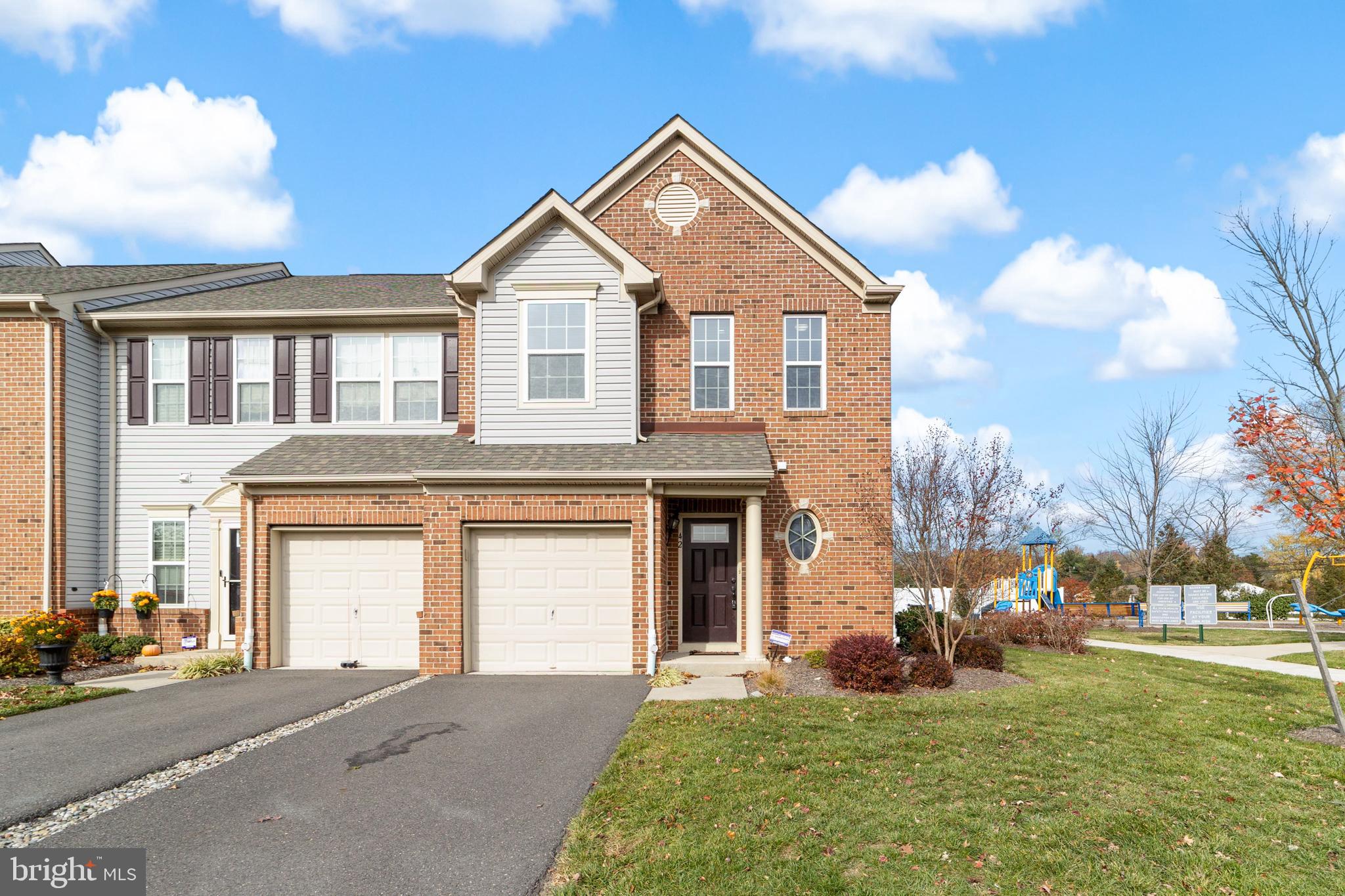 42 Sundance Drive Hamilton, NJ 08619 - Photo 2 of 25 a front view of a house with a yard