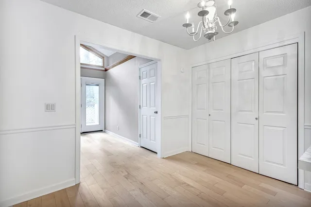 a view of a chandelier in a room