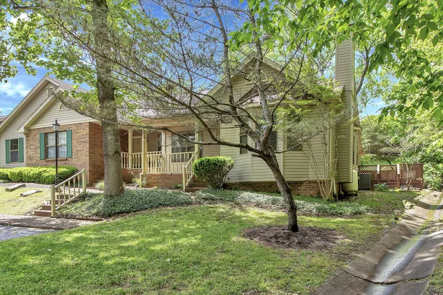a backyard of a house with seating space