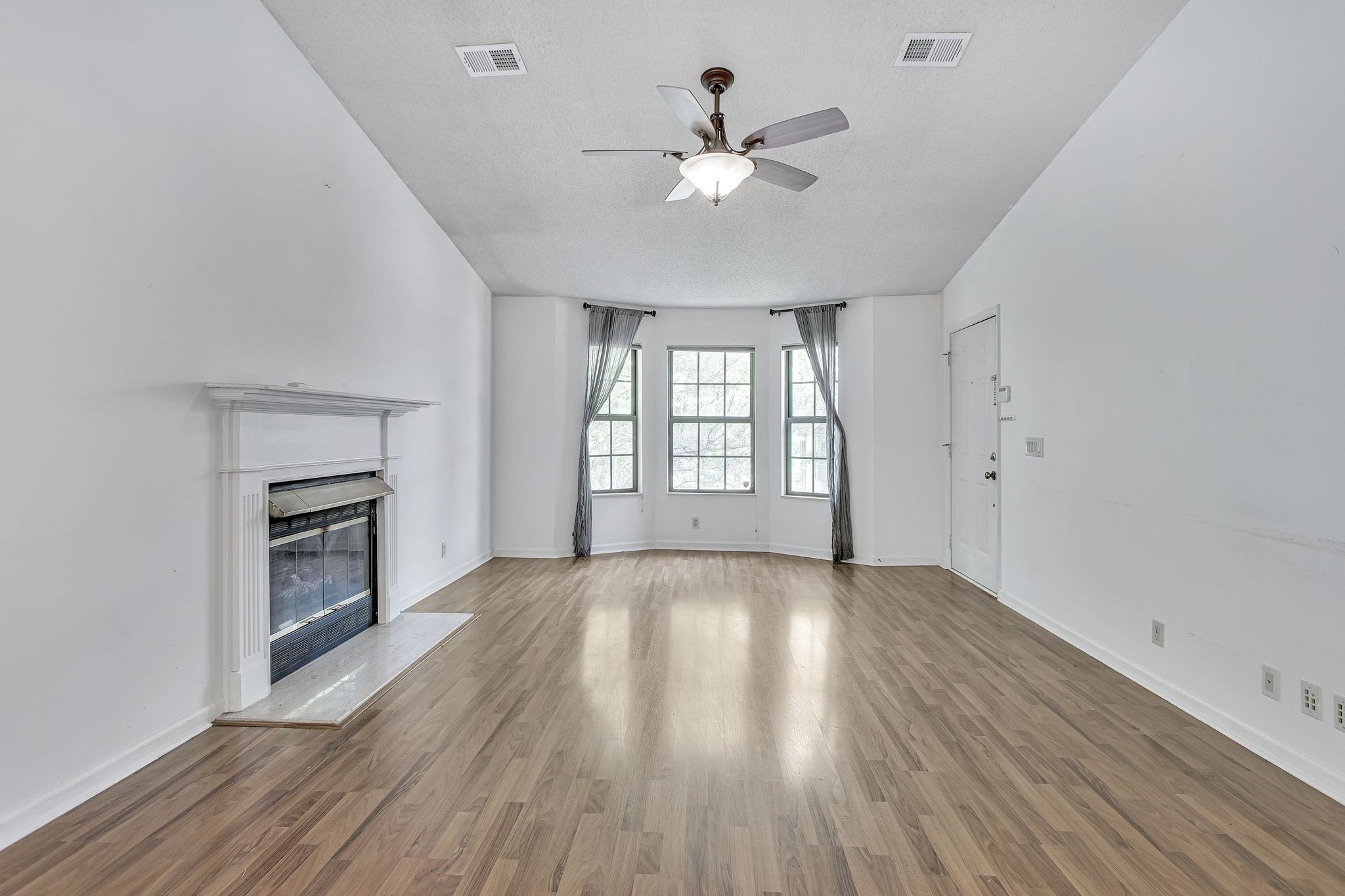 816 Beazer Lane Antioch, TN 37013 - Photo 7 of 32 wooden floor in an empty room with a window