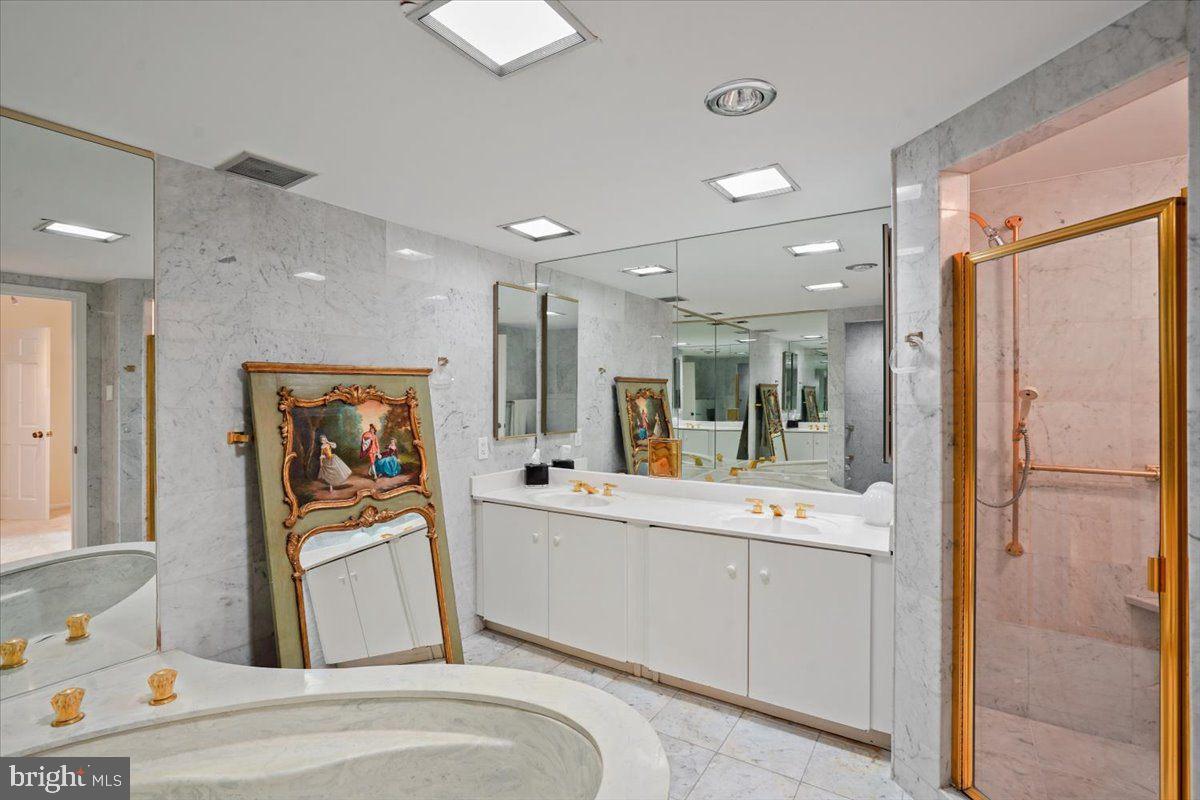 800 25th Street Northwest, Unit 504 Washington, DC 20037 - Photo 39 of 52 Elegant marble bathroom retreat.