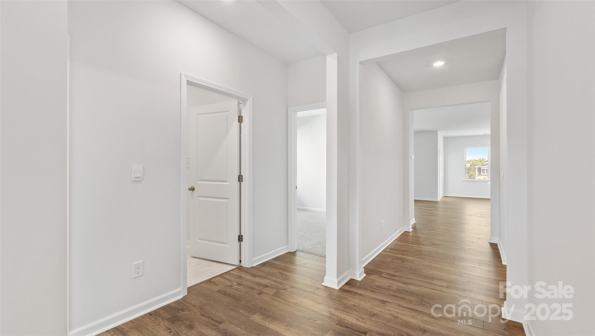 119 Bovine Br Road Fletcher, NC 28732 - Photo 14 of 29 a view of a hallway with wooden floor