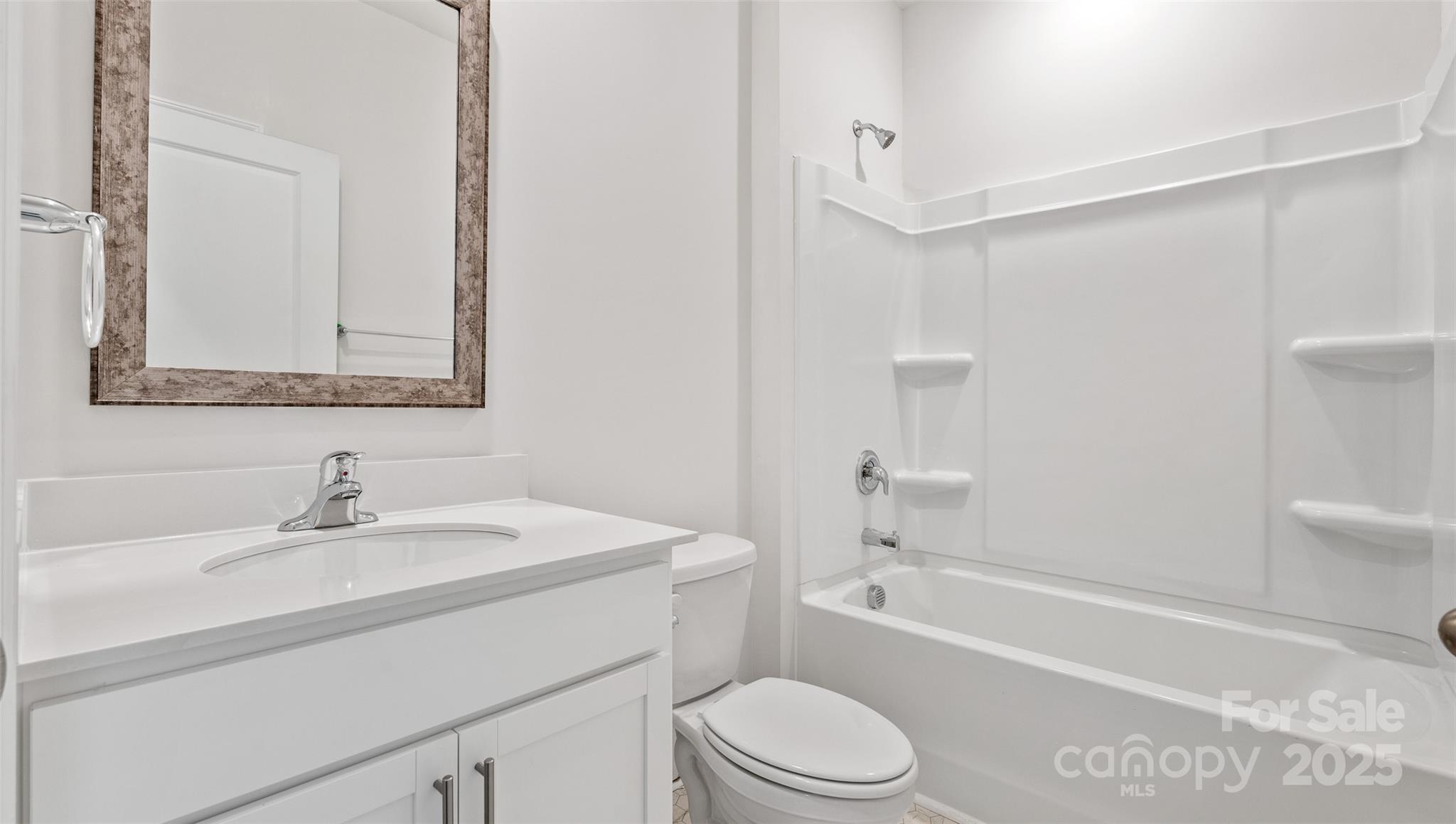 119 Bovine Br Road Fletcher, NC 28732 - Photo 17 of 29 a bathroom with a sink a toilet and shower