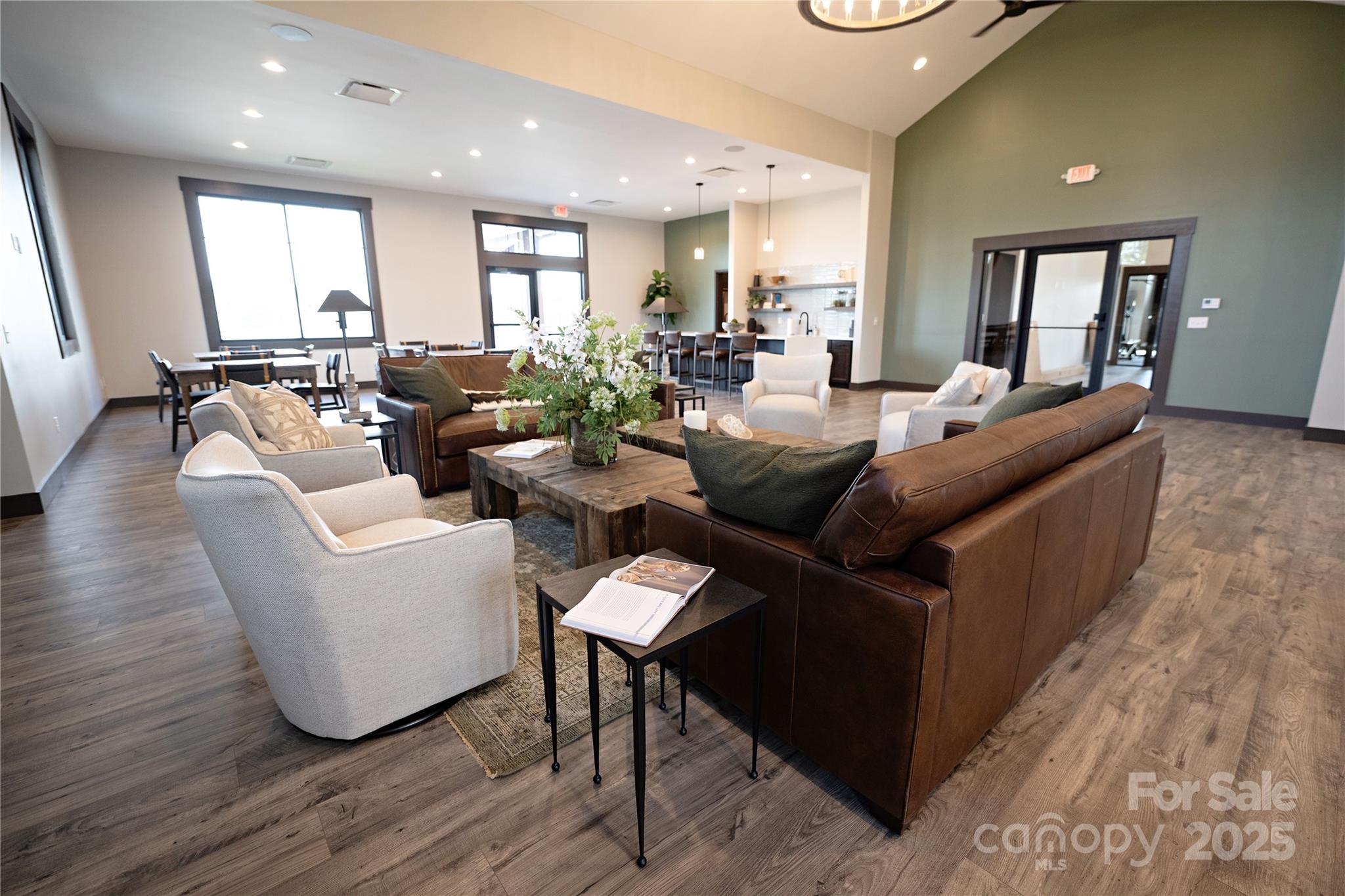 119 Bovine Br Road Fletcher, NC 28732 - Photo 27 of 29 a living room with furniture potted plant and wooden floor