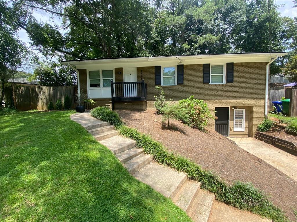2466 Bouldercliff Way Southeast Atlanta, GA 30316 - Photo 1 of 1 a view of a house with a yard
