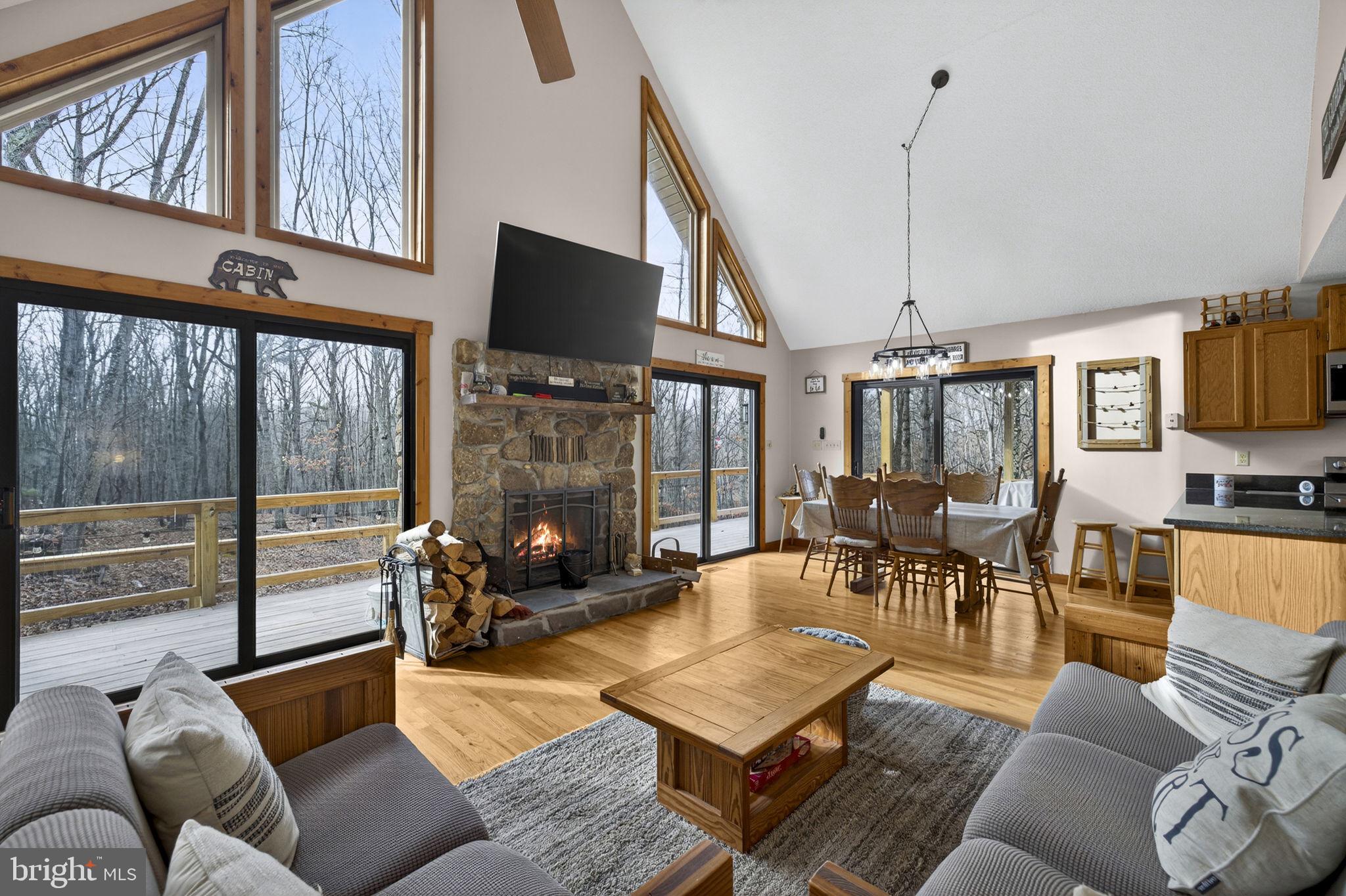 Enter to the Great Room featuring vaulted ceiling