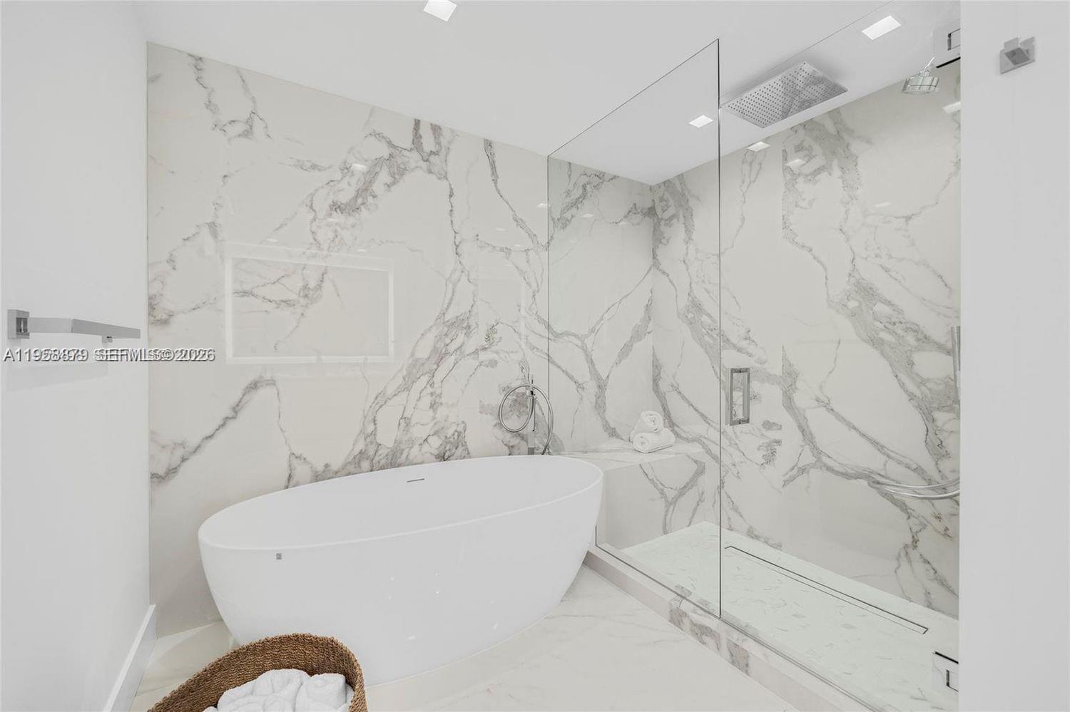 100 South Pointe Drive, Unit TH13 Miami Beach, FL 33139 - Photo 31 of 69 a bathroom with a bathtub and shower