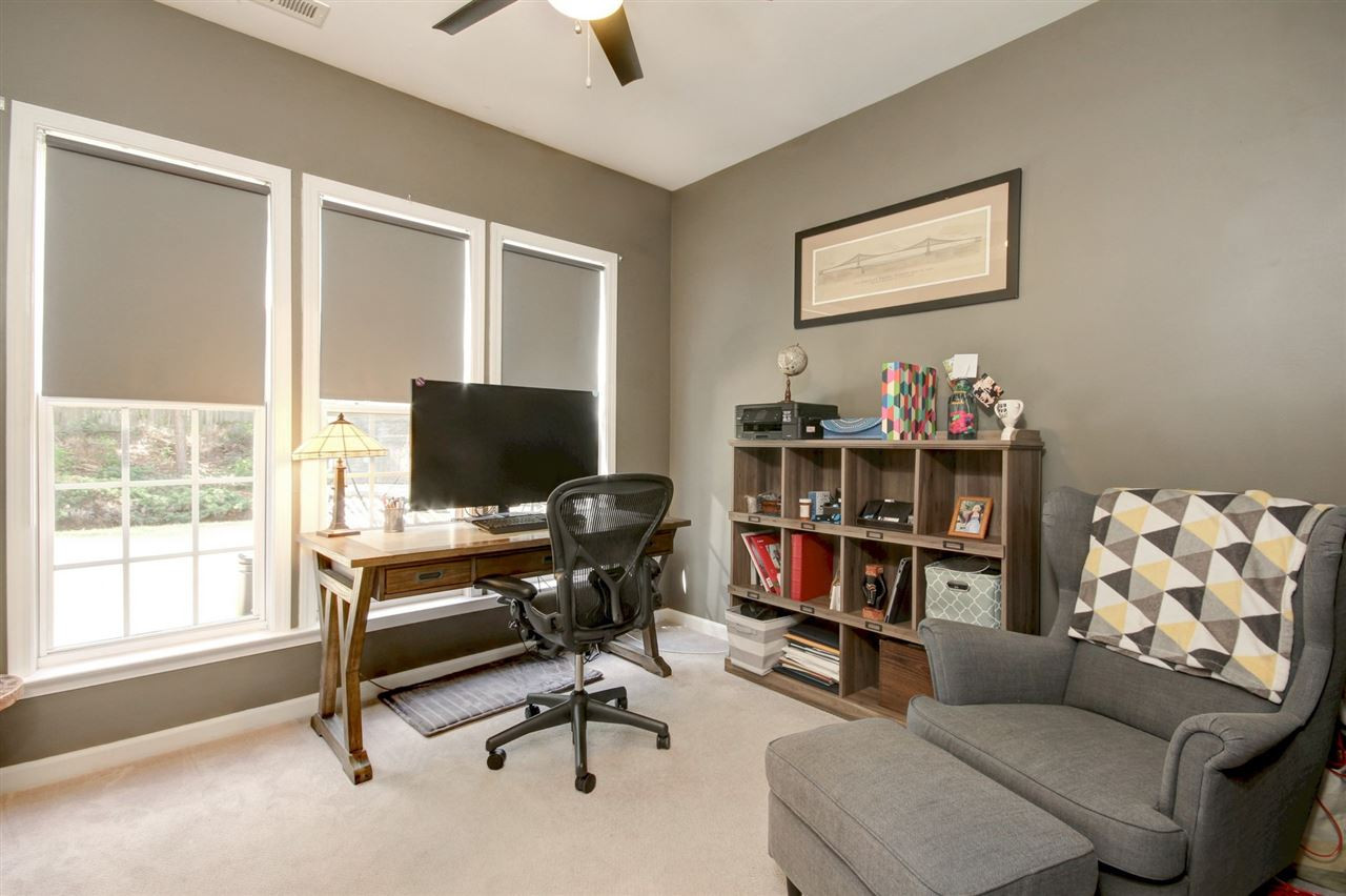 7532 Silver View Lane Raleigh, NC 27613 - Photo 12 of 30 Inviting first floor office with calming paint colors and French doors for privacy. Office