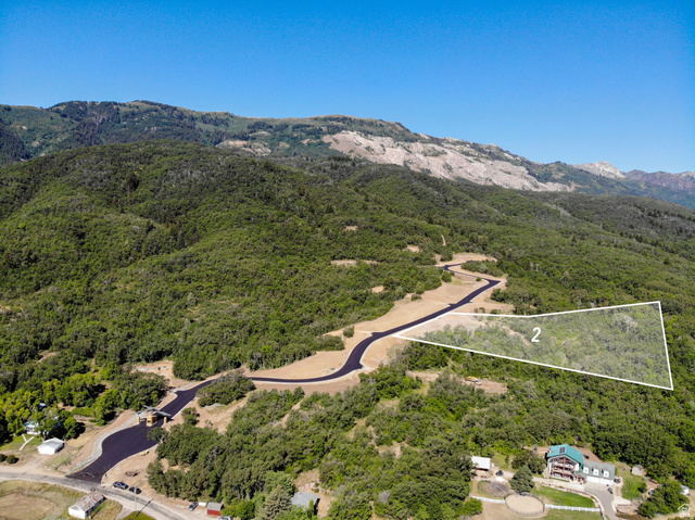 2808 East Arrowleaf Lane, Unit 2 Eden, UT 84310 - Photo 2 of 15 Aerial view of property's location featuring property parcel outlined and a mountainous background
