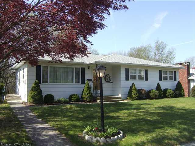 520 Scott Road Waterbury, CT 06705 - Photo 1 of 1 a front view of a house with a yard