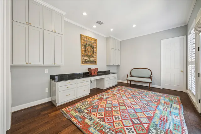 a kitchen with stainless steel appliances granite countertop a sink and cabinets