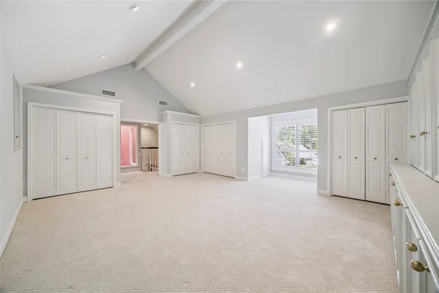 a bathroom with a granite countertop sink a toilet and a mirror