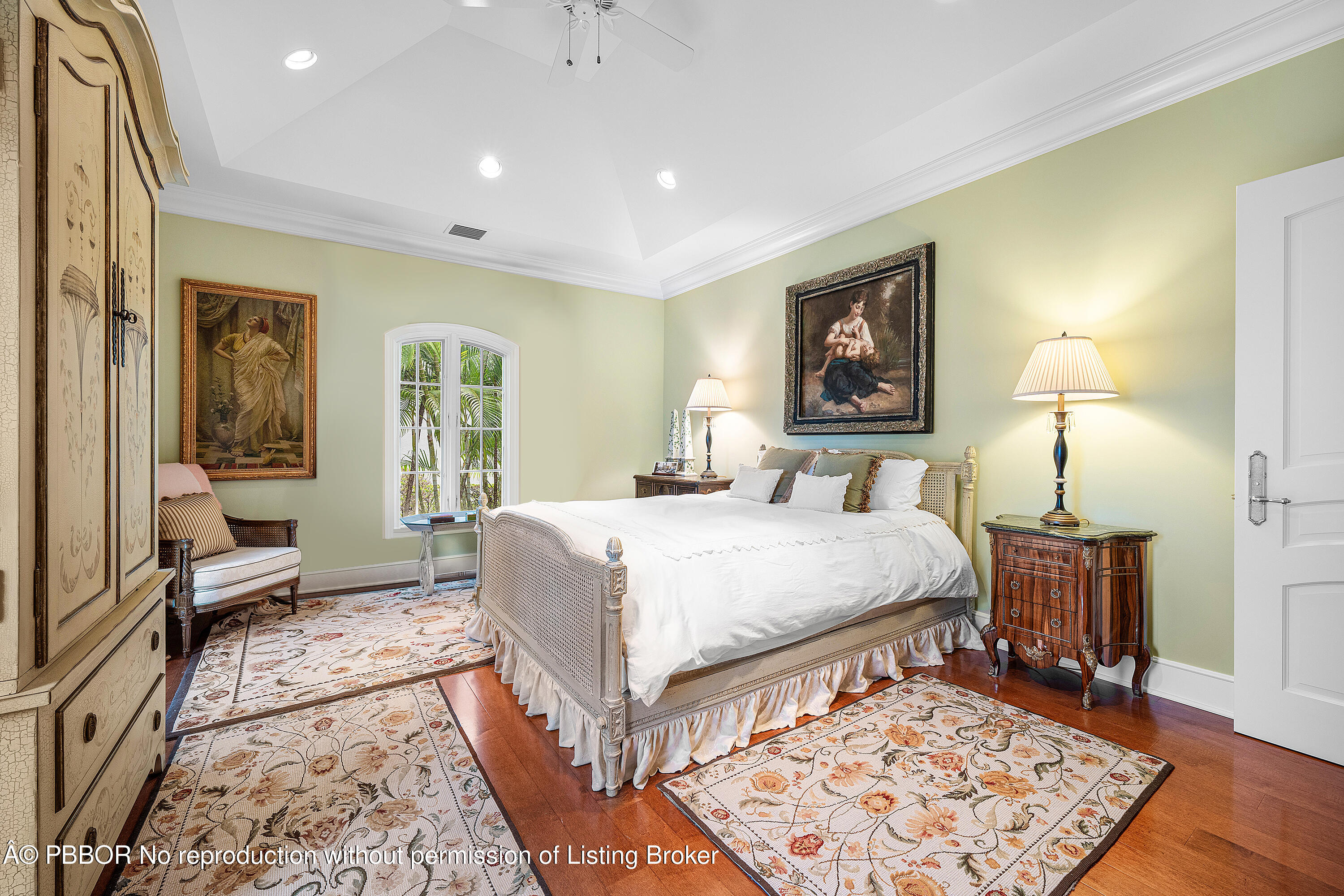 242 Wells Road Palm Beach, FL 33480 - Photo 28 of 54 a bed room with a bed and a lamp