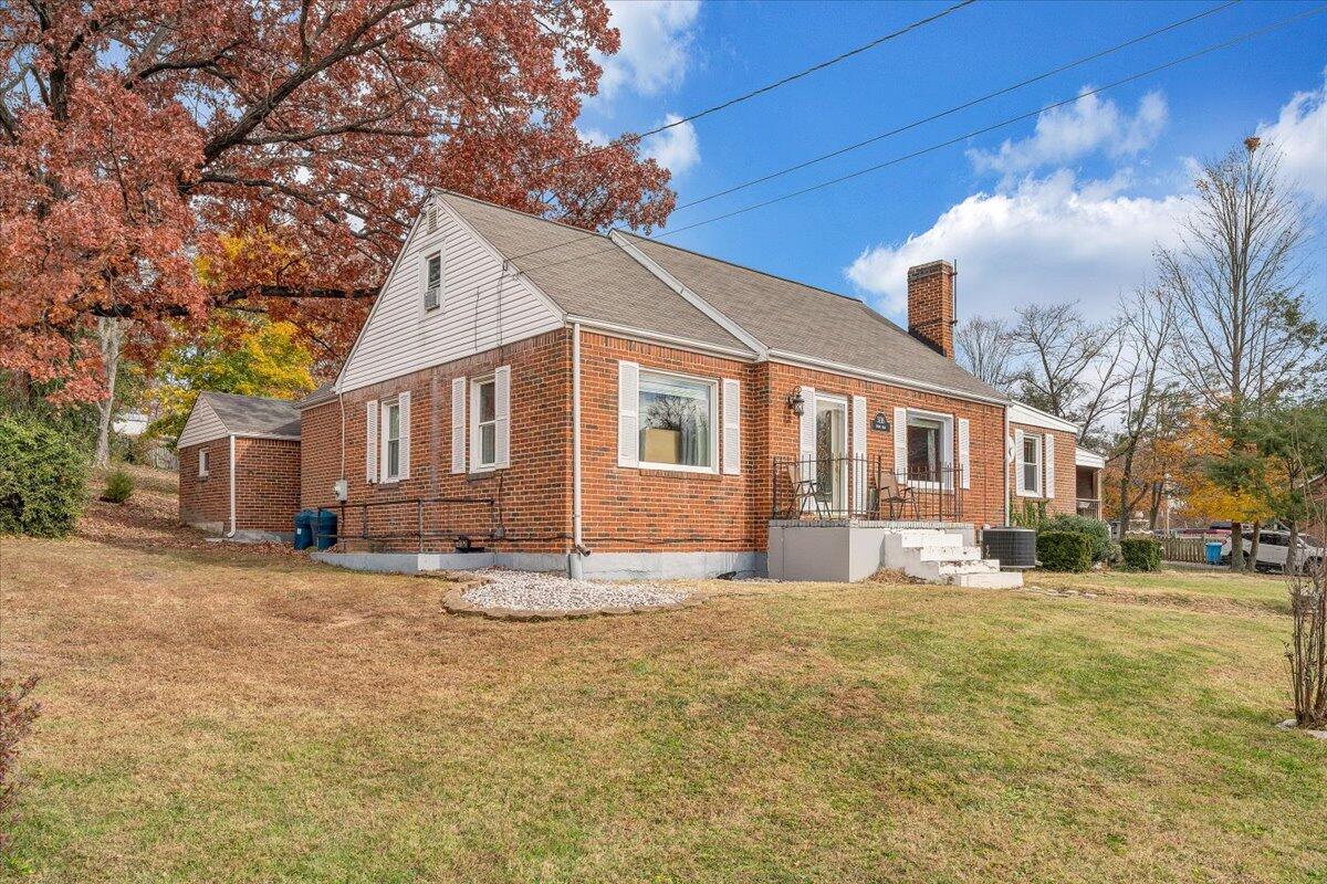 3116 Spring Road Southwest Roanoke, VA 24015 - Photo 1 of 22 a view of a yard in front of a house