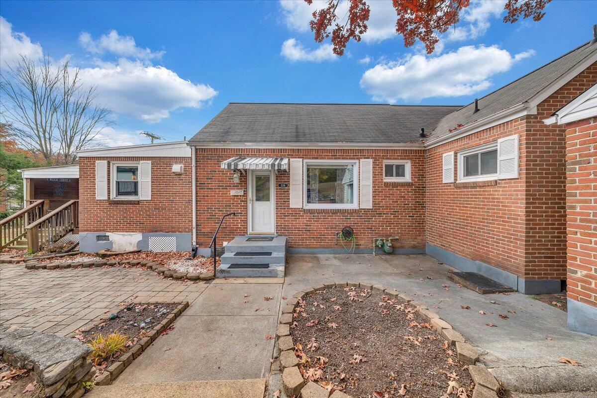 3116 Spring Road Southwest Roanoke, VA 24015 - Photo 19 of 22 a front view of a house