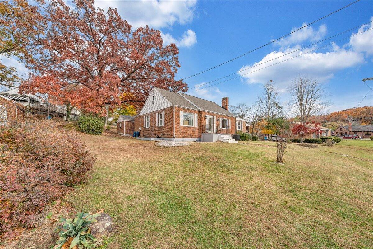 3116 Spring Road Southwest Roanoke, VA 24015 - Photo 22 of 22 a front view of a house with swimming pool