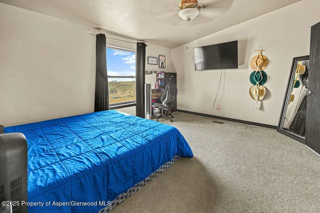 a room with furniture and a wooden floor