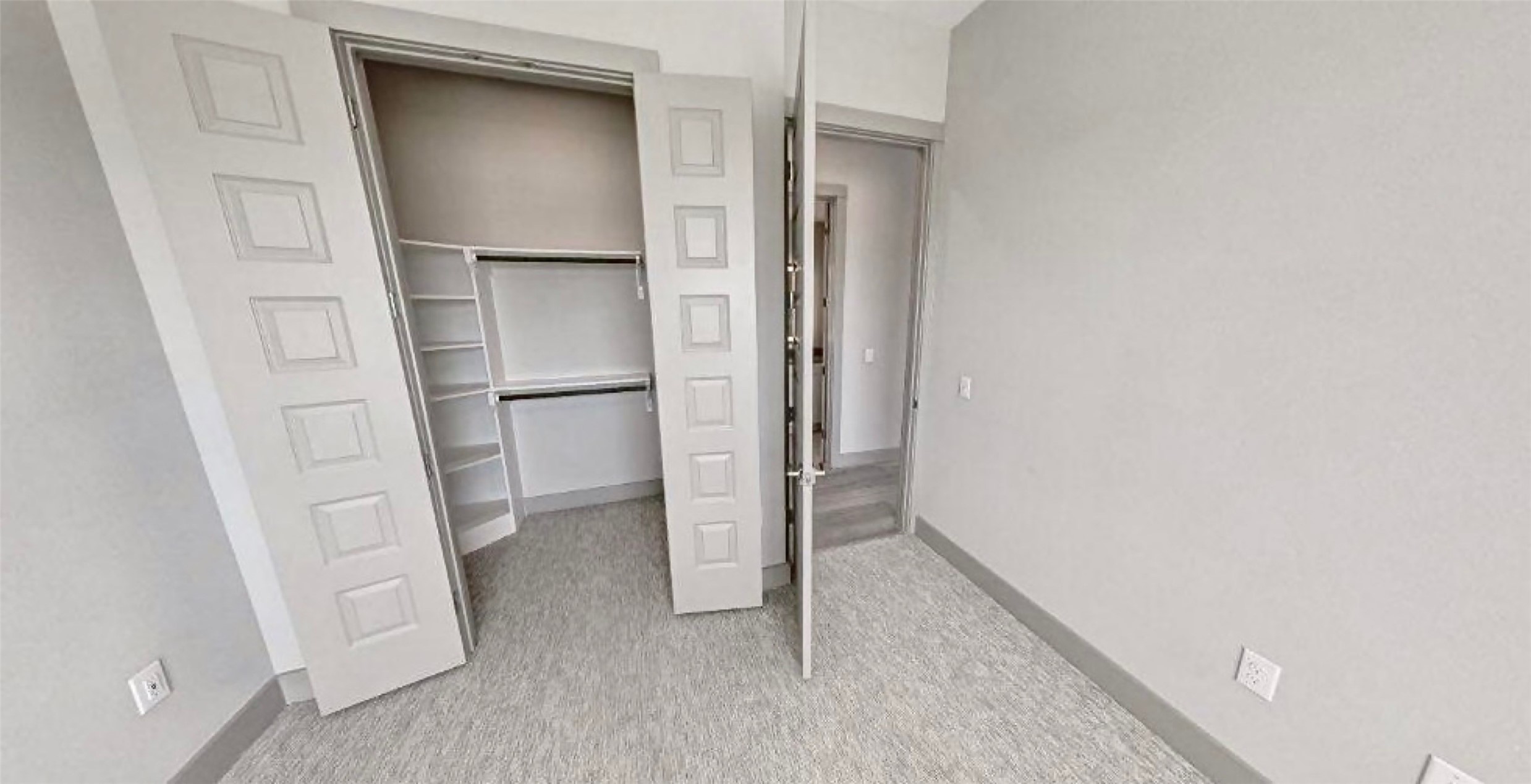 401 West 25th Street, Unit 1144 Houston, TX 77008 - Photo 12 of 42 a view of walk in closet with empty racks