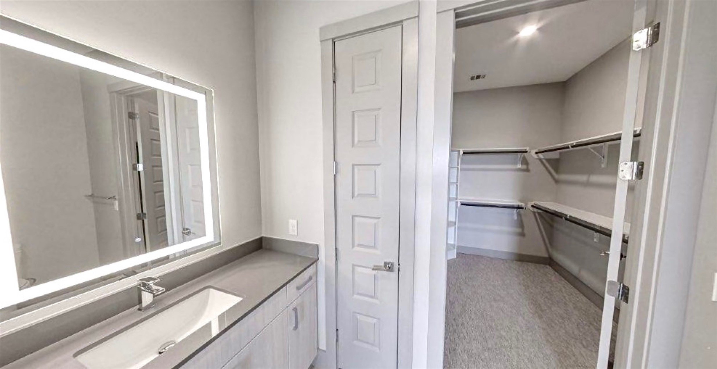 401 West 25th Street, Unit 1144 Houston, TX 77008 - Photo 14 of 42 a kitchen with a refrigerator and white doors