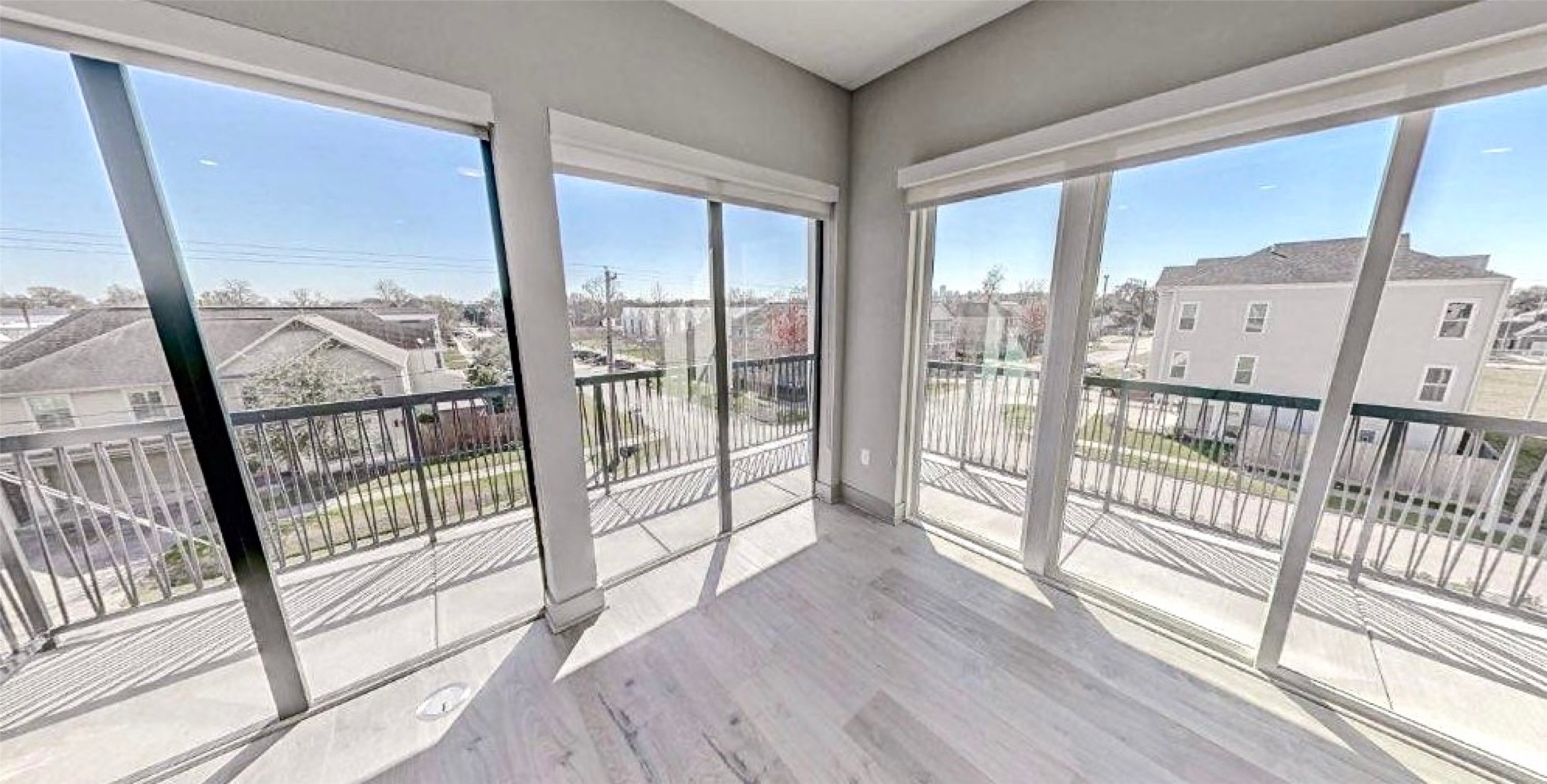 401 West 25th Street, Unit 1144 Houston, TX 77008 - Photo 2 of 42 a view of a room with wooden floor and windows