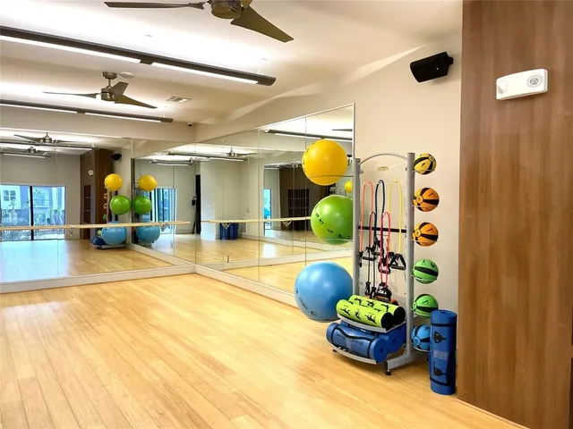 a lobby with furniture and floor to ceiling window