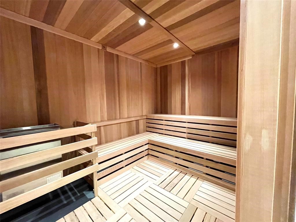 401 West 25th Street, Unit 1144 Houston, TX 77008 - Photo 27 of 42 a view of a closet area with wooden floor