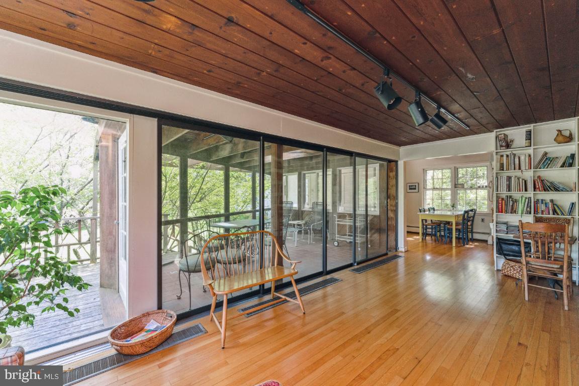 1807 Kenway Road Baltimore, MD 21209 - Photo 11 of 54 a room with gym equipment and wooden floor