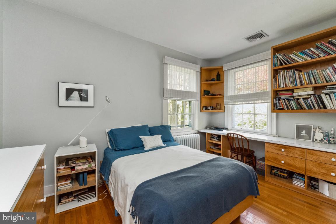 1807 Kenway Road Baltimore, MD 21209 - Photo 24 of 54 a bedroom with a bed and a desk