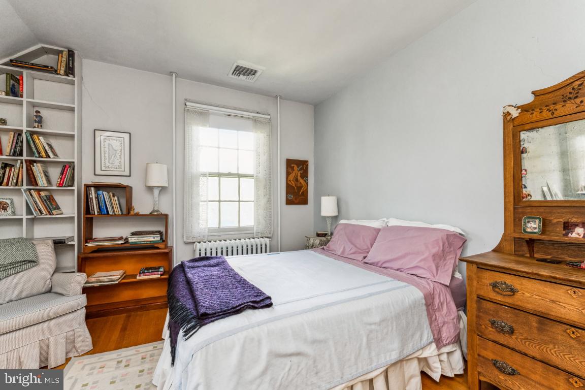 1807 Kenway Road Baltimore, MD 21209 - Photo 28 of 54 a bedroom with a bed and a window