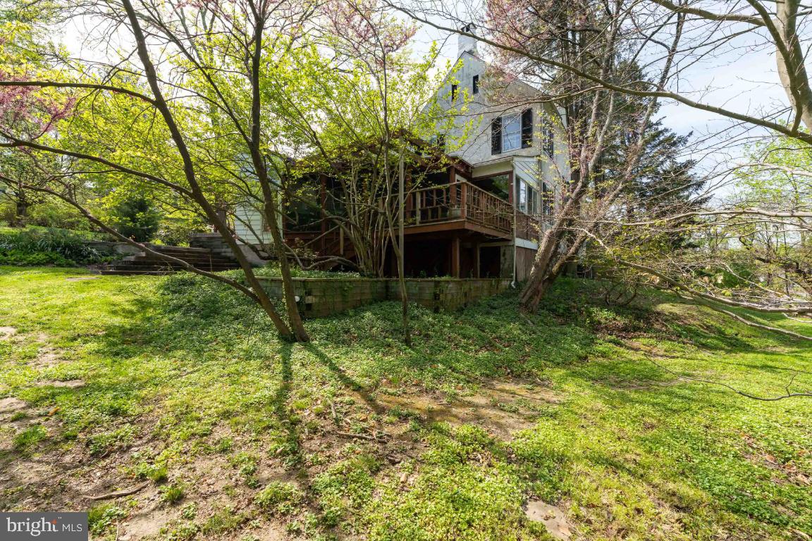 1807 Kenway Road Baltimore, MD 21209 - Photo 35 of 54 a view of a house with a yard