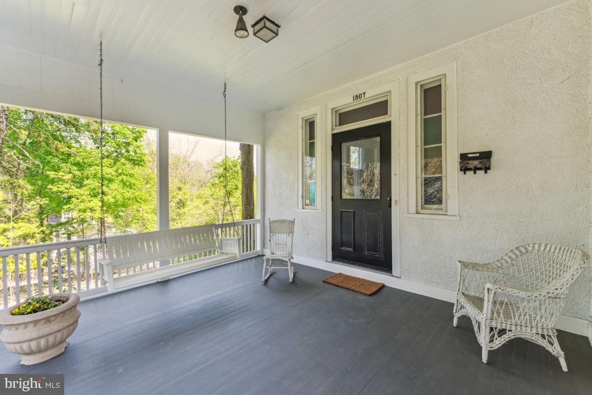 1807 Kenway Road Baltimore, MD 21209 - Photo 4 of 54 a view of an empty room with a window