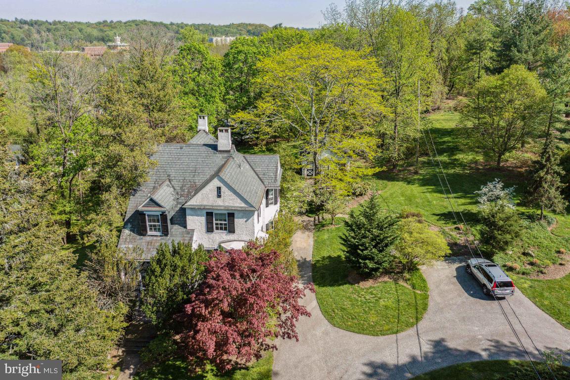 1807 Kenway Road Baltimore, MD 21209 - Photo 41 of 54 an aerial view of a house with a yard and lake view