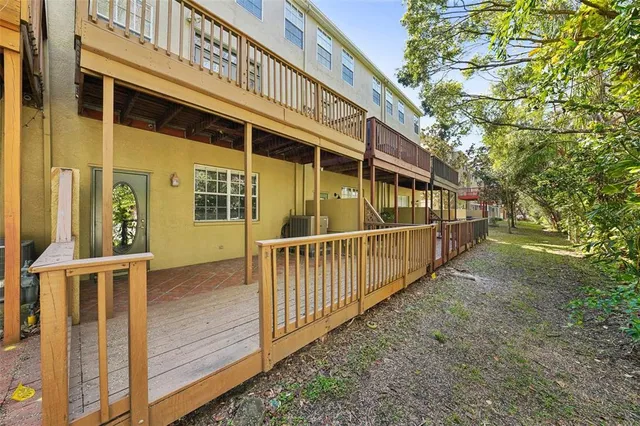 a bathroom with a sink a mirror and a shower