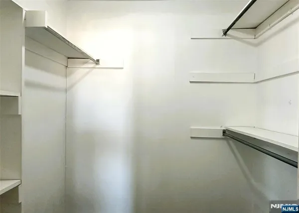 a view of small space with racks on the wall