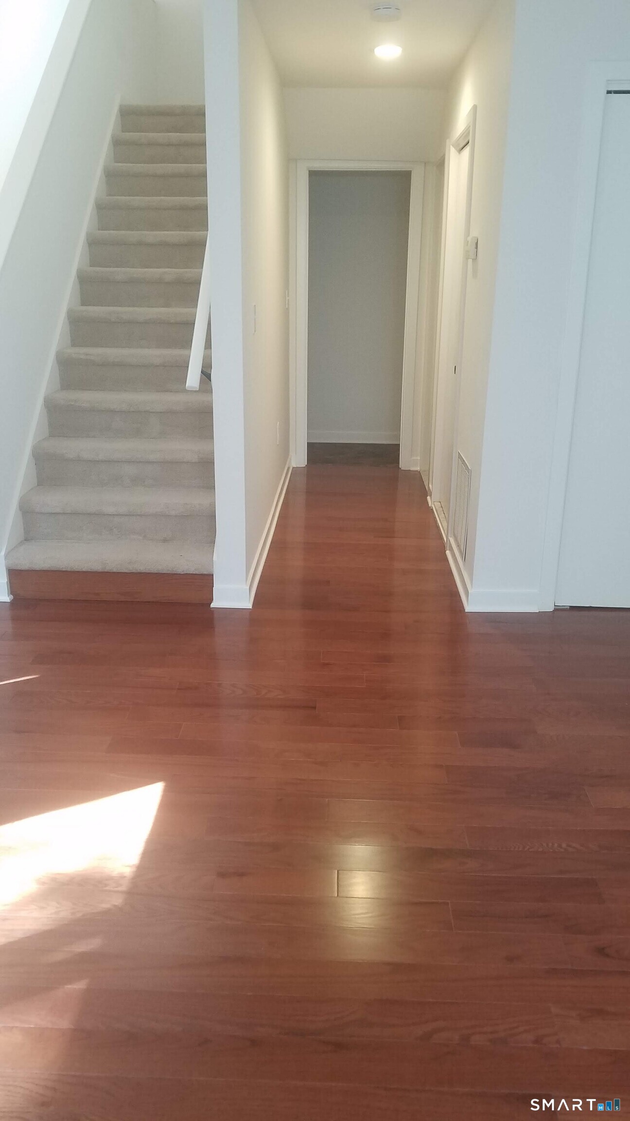 6 Timberline Drive, Unit 6 Farmington, CT 06032 - Photo 17 of 26 a view of entryway with wooden floor