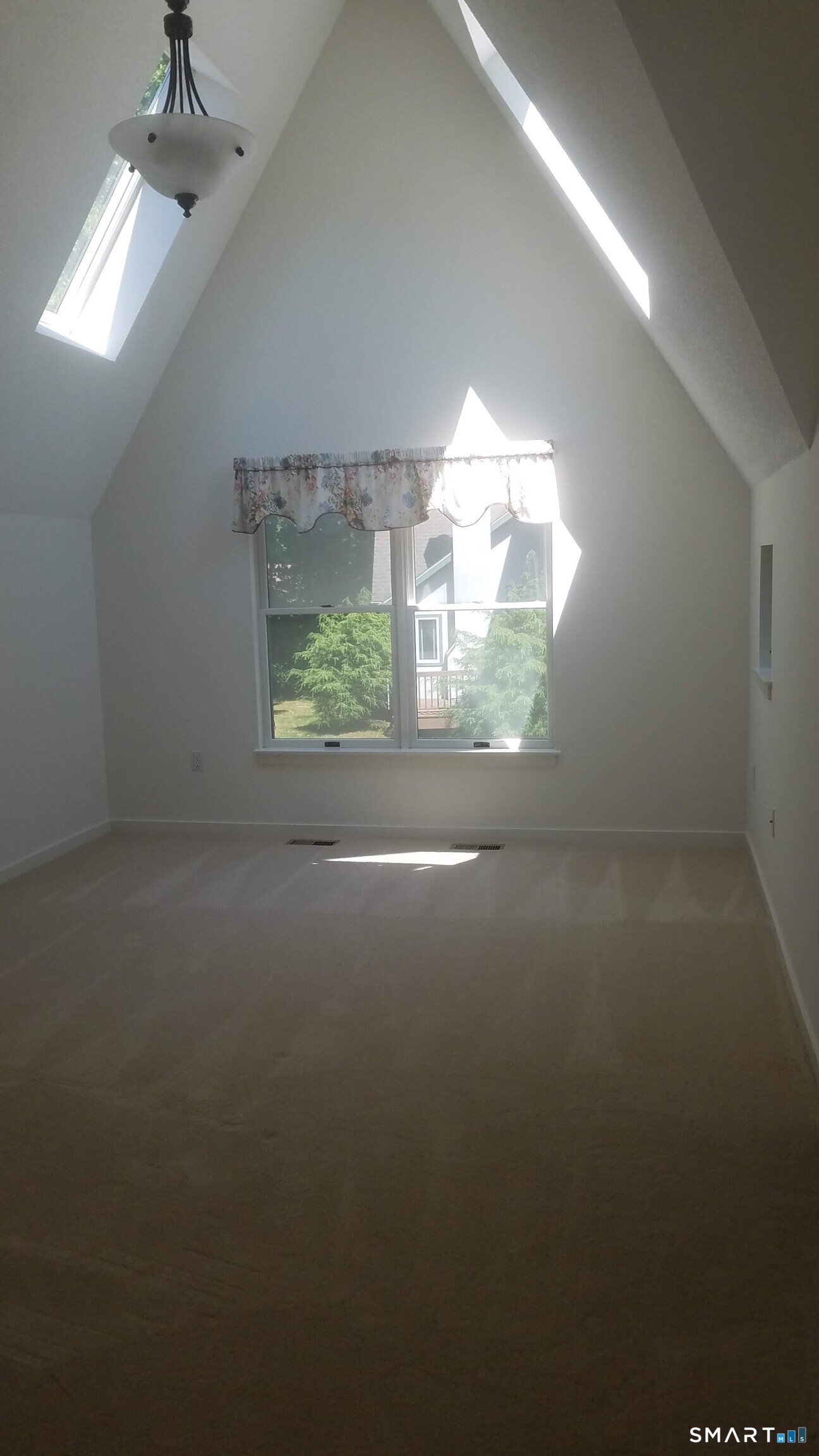 6 Timberline Drive, Unit 6 Farmington, CT 06032 - Photo 19 of 26 an empty room with windows and yard