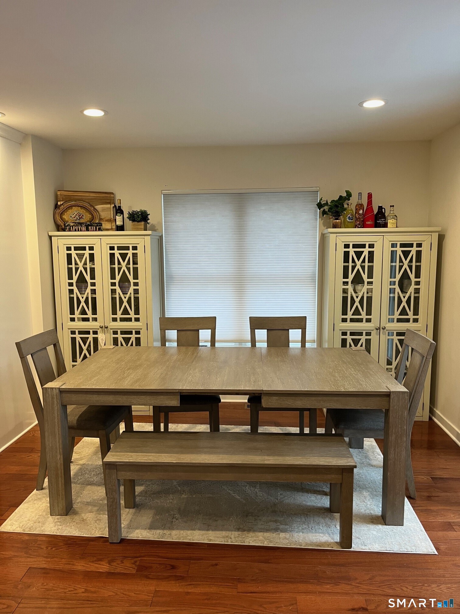 6 Timberline Drive, Unit 6 Farmington, CT 06032 - Photo 8 of 26 a view of a kitchen with dining table and chairs