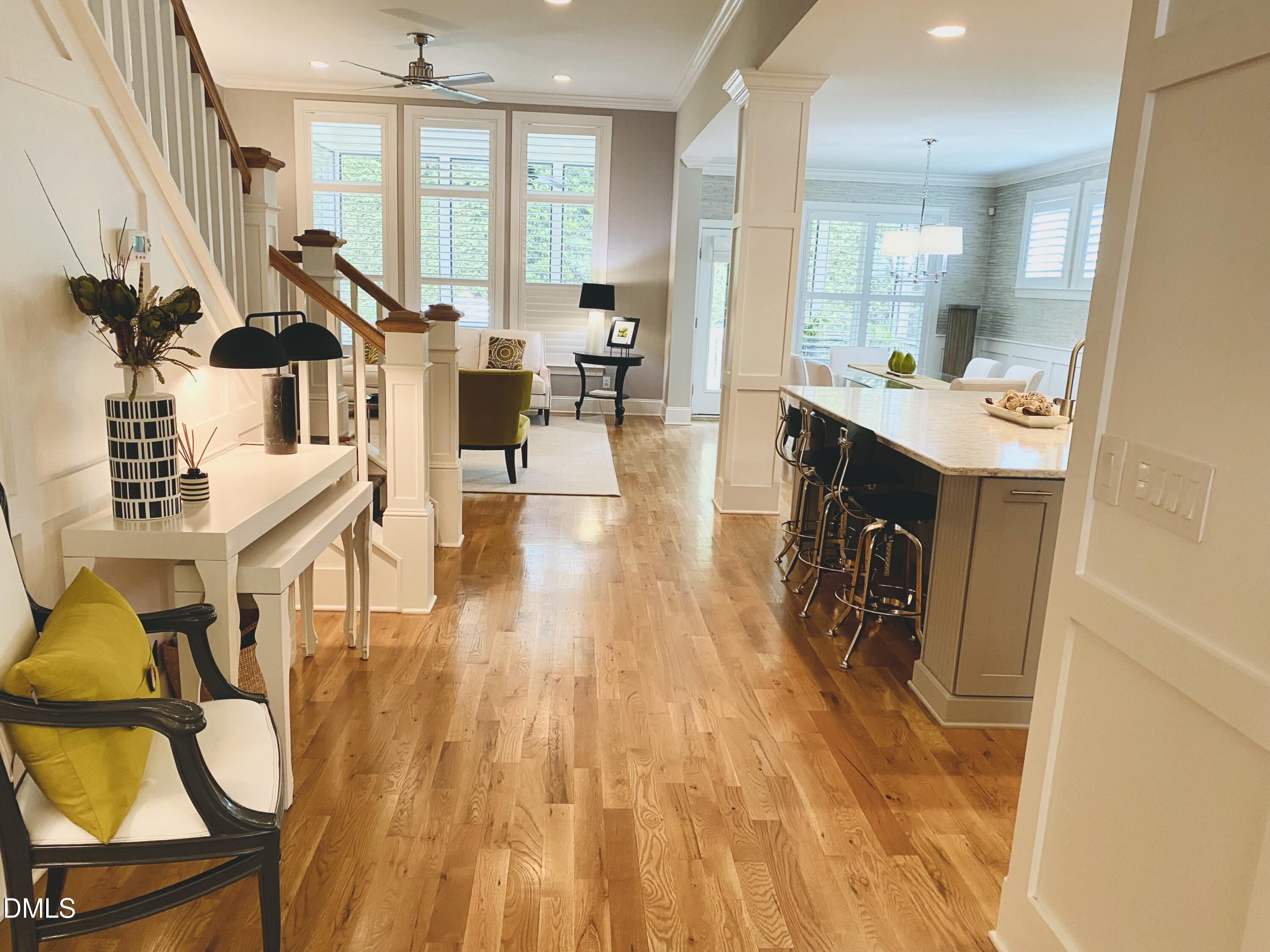 11821 Friendship Oak Trail Raleigh, NC 27613 - Photo 11 of 49 View from entryway into kitchen and great room