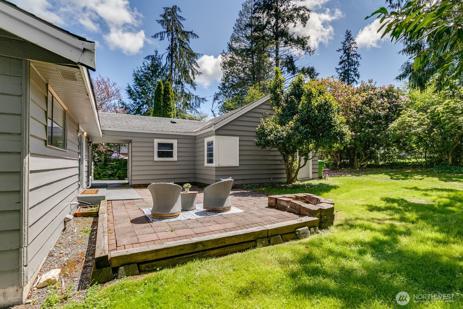 3822 Shelby Road Lynnwood, WA 98087 - Photo 18 of 40 a view of a backyard with sitting area