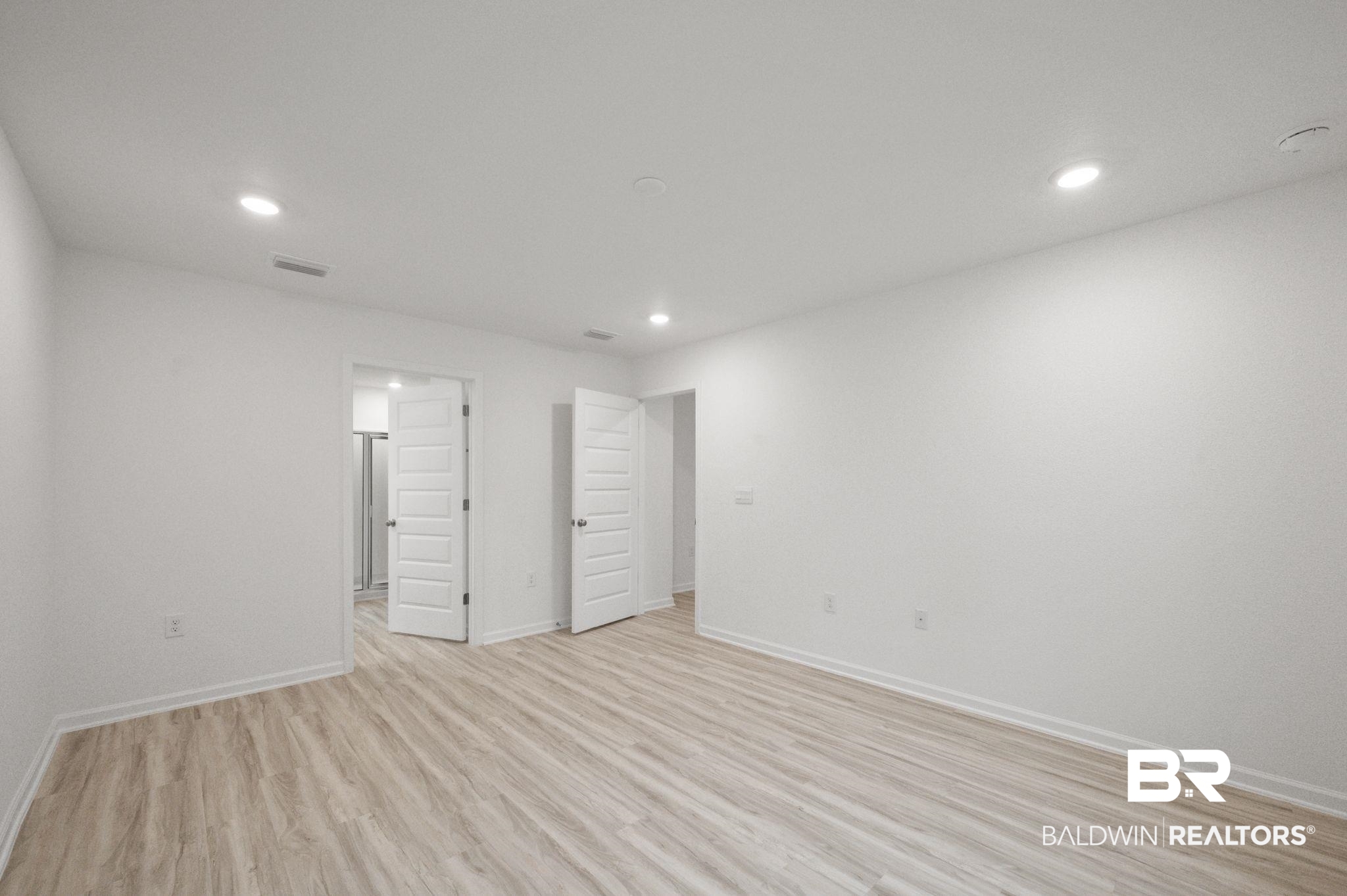 16272 Laurelbrooke Loop Fairhope, AL 36532 - Photo 39 of 40 Unfurnished bedroom featuring light wood-type flooring