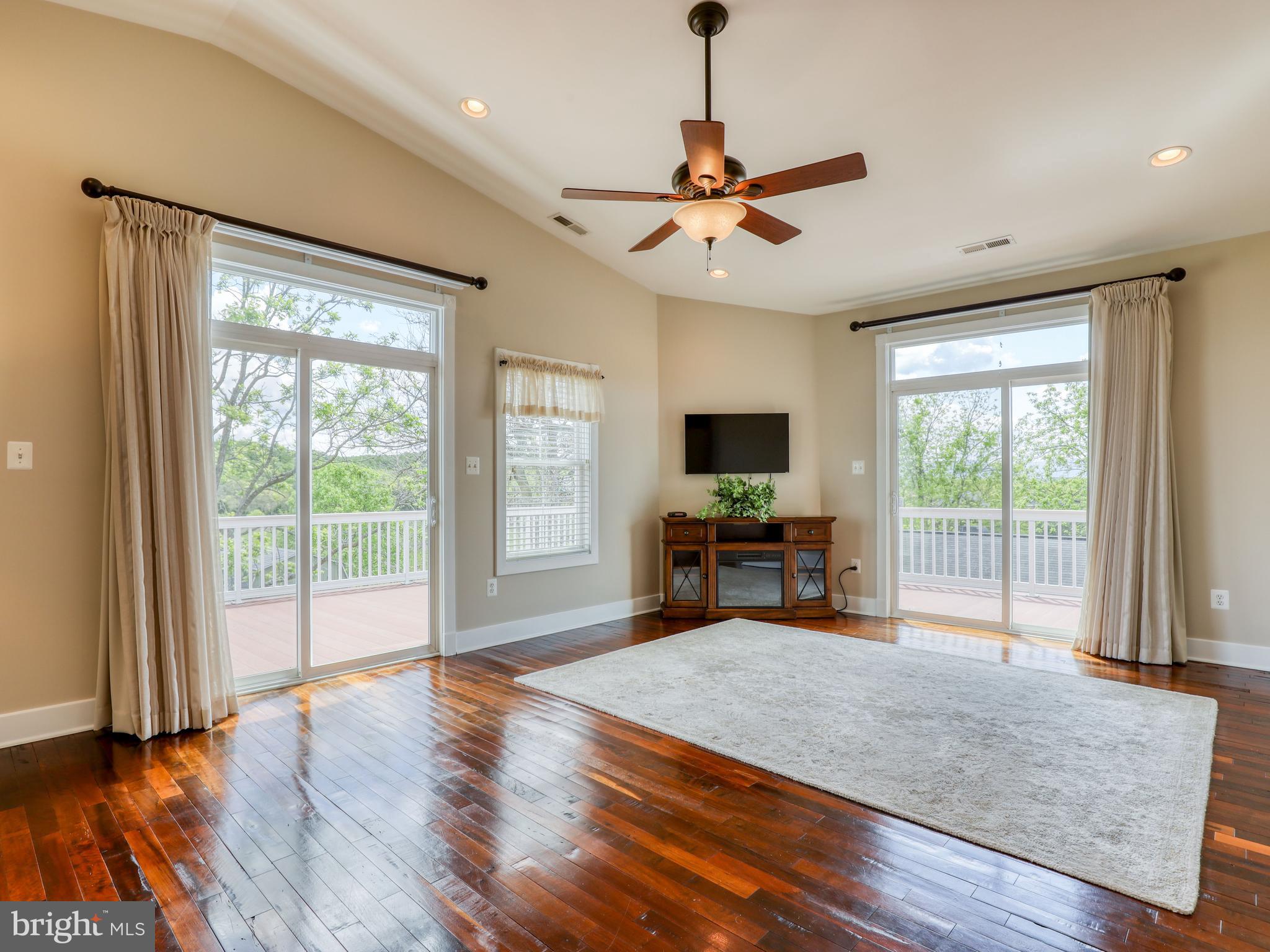 902 Forest Grove Road Middletown, VA 22645 - Photo 58 of 84 Master bedroom with electric fireplace and tv inc